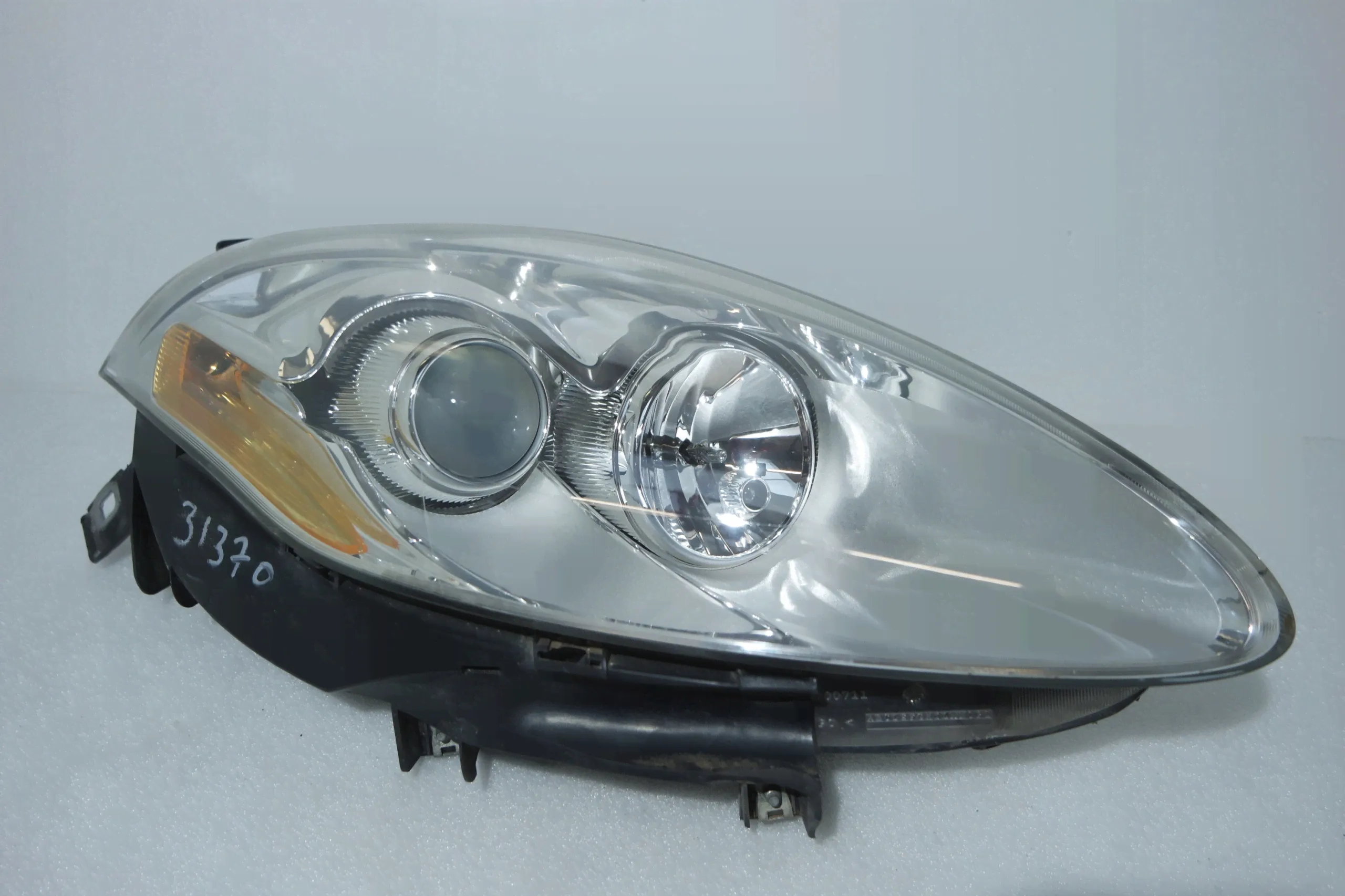 Фара левая Fiat Bravo 2 поколение (2007-2014), 7573950